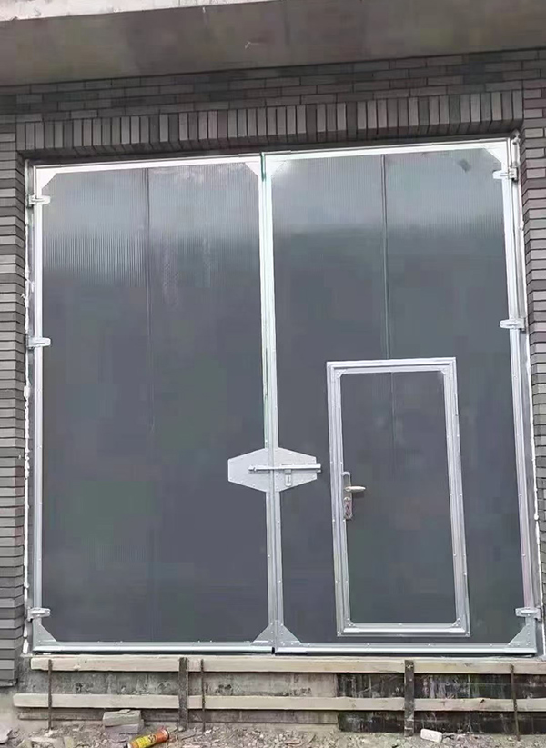 民勤工业平开门在大型设备制造车间的应用实例